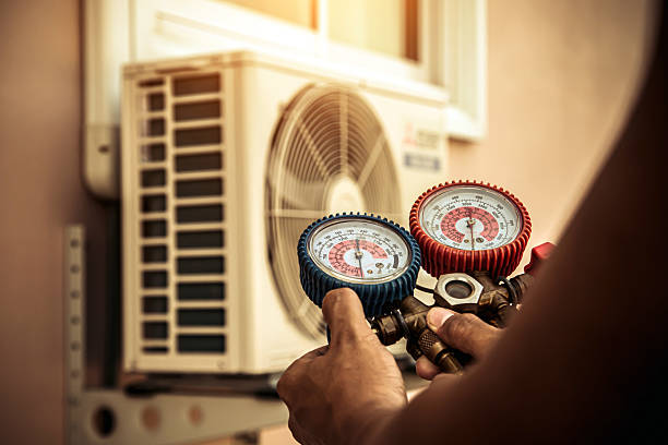 Professional Air Conditioning Service technician working in Arvin, CA